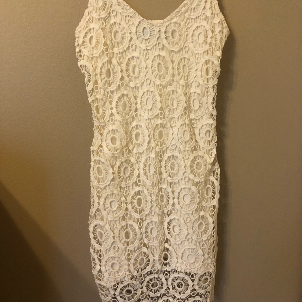 A cream lace mini dress